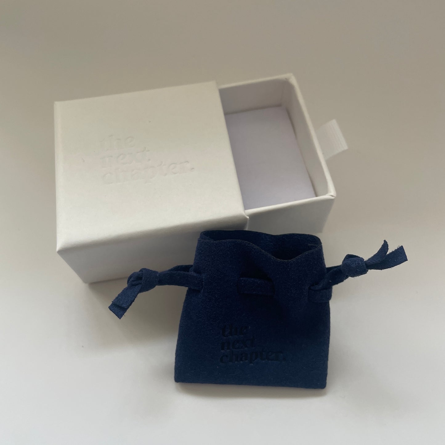 the SIMPLISTIC charm (Emerald)