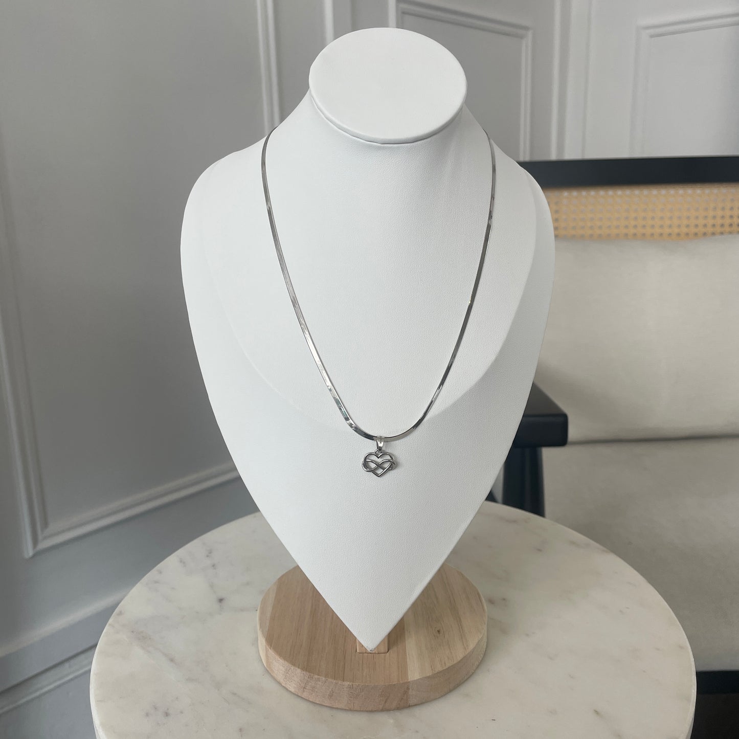 the INFINITE LOVE charm