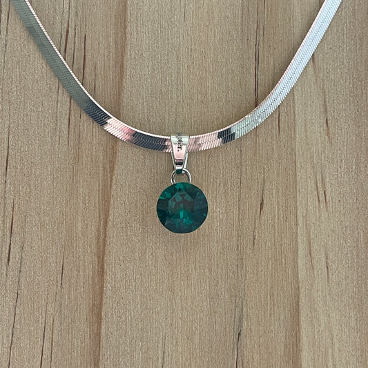 the SIMPLISTIC charm (Emerald)
