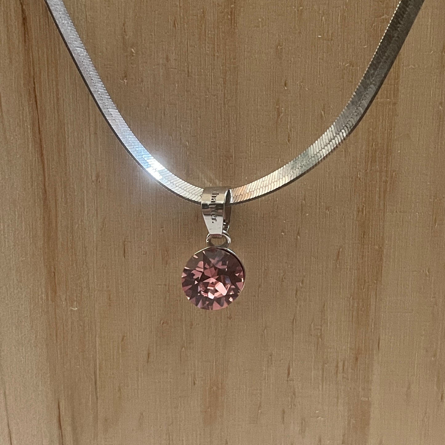 the SIMPLISTIC charm (Light Rose)