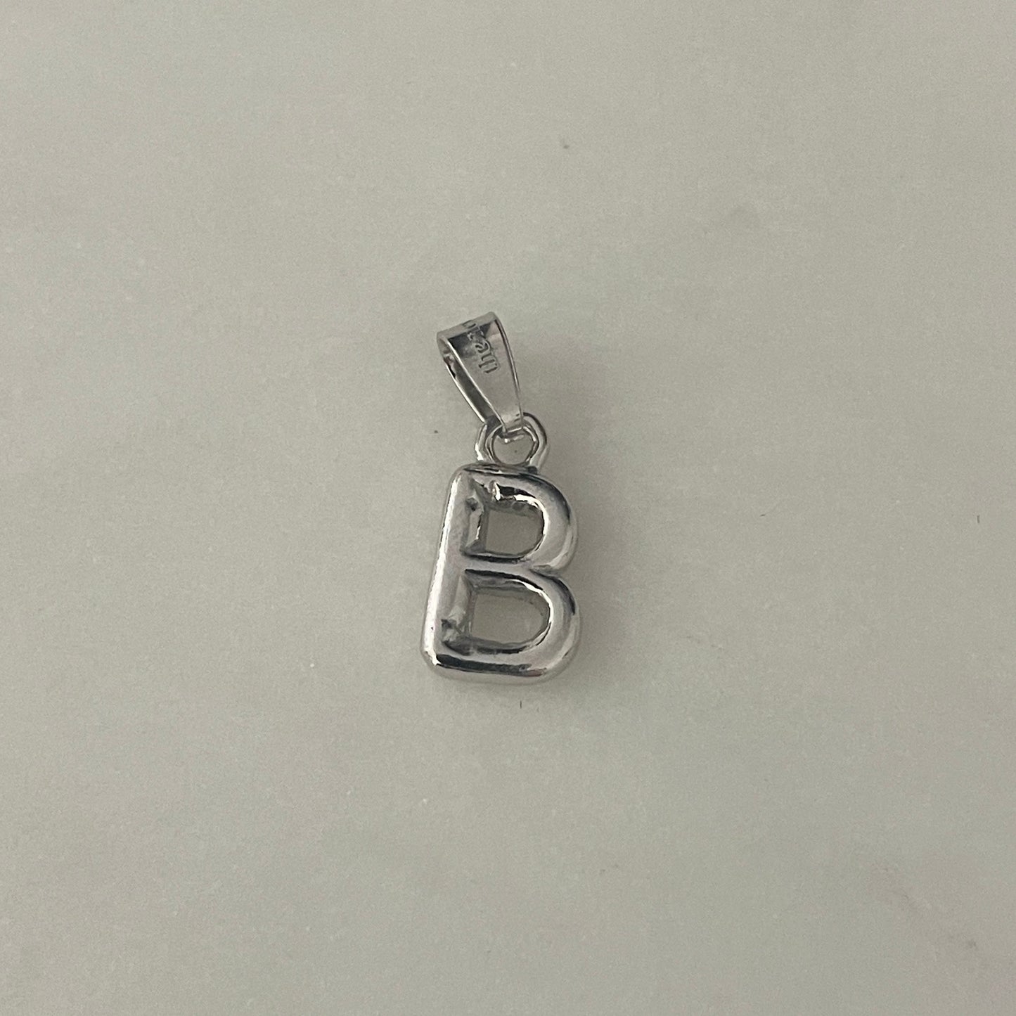 the BUBBLE LETTER charm
