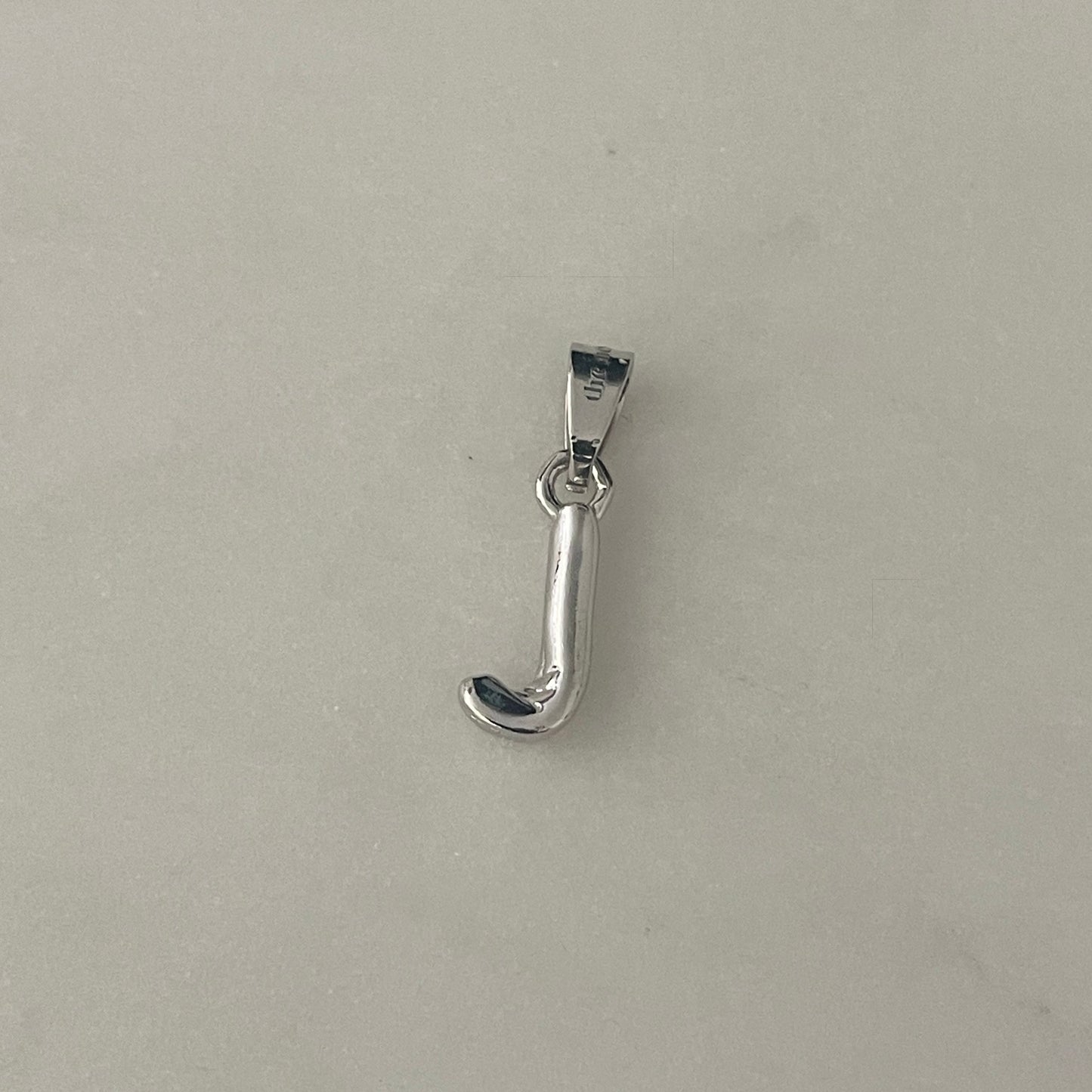 the BUBBLE LETTER charm