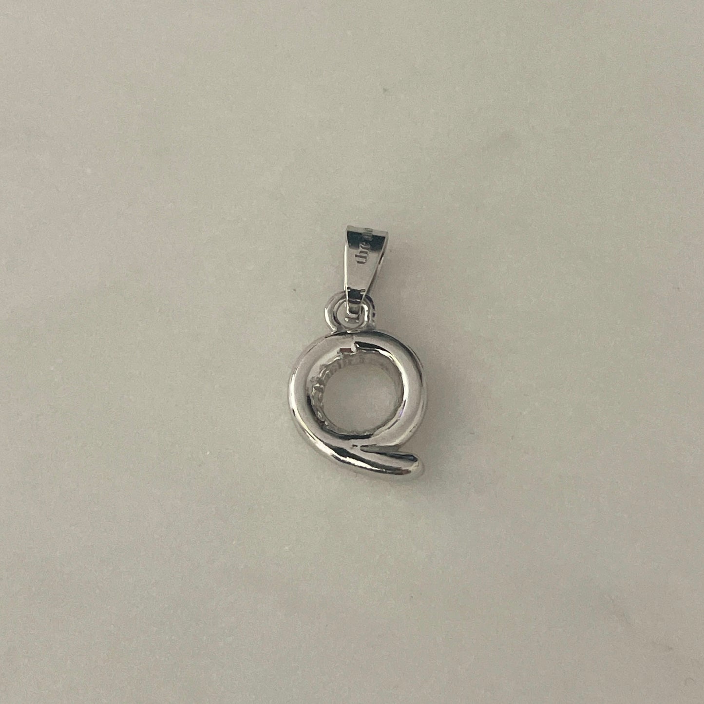 the BUBBLE LETTER charm