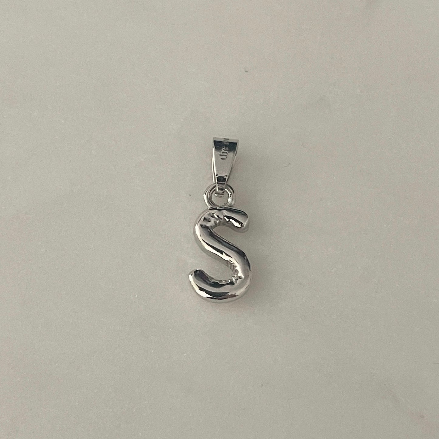 the BUBBLE LETTER charm