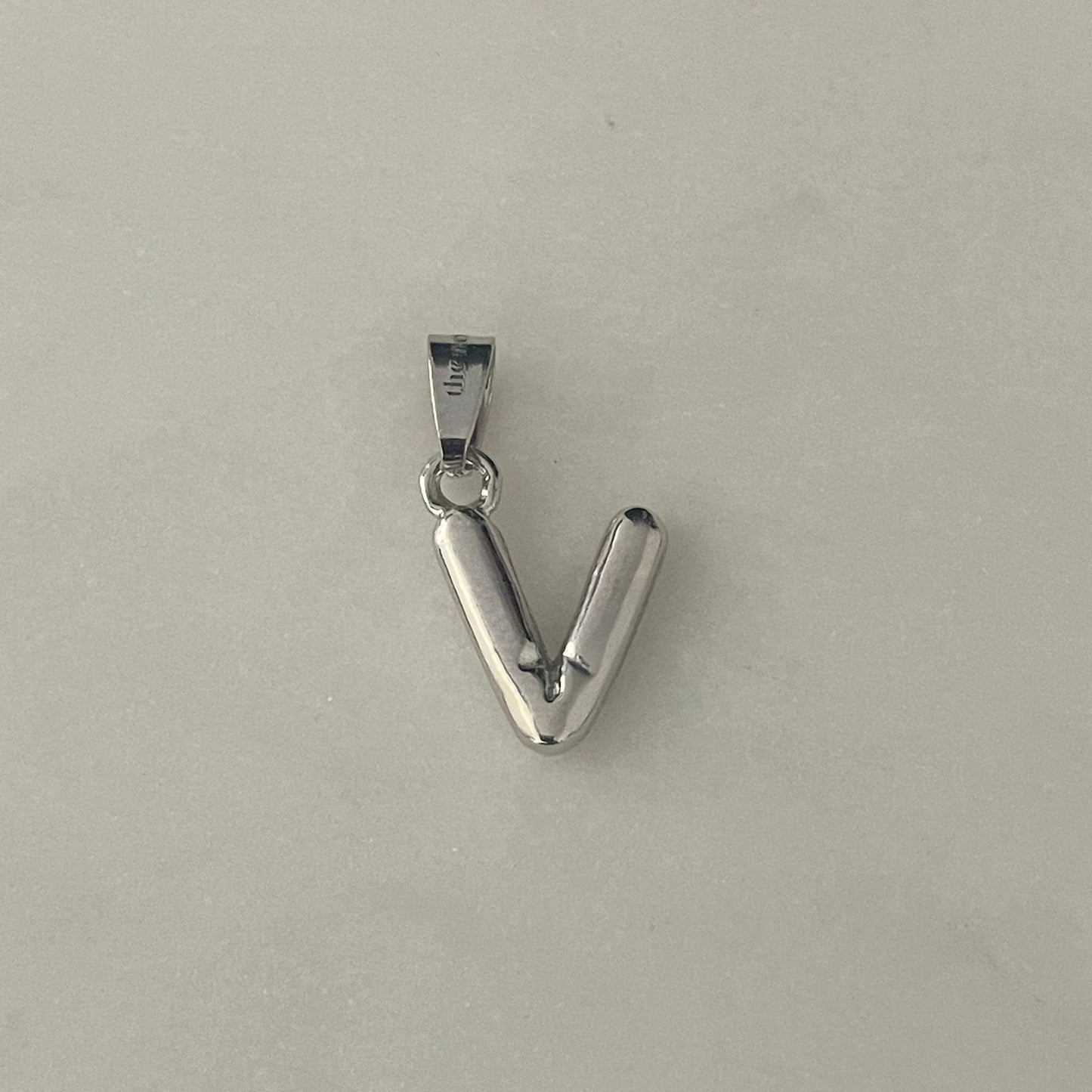 the BUBBLE LETTER charm