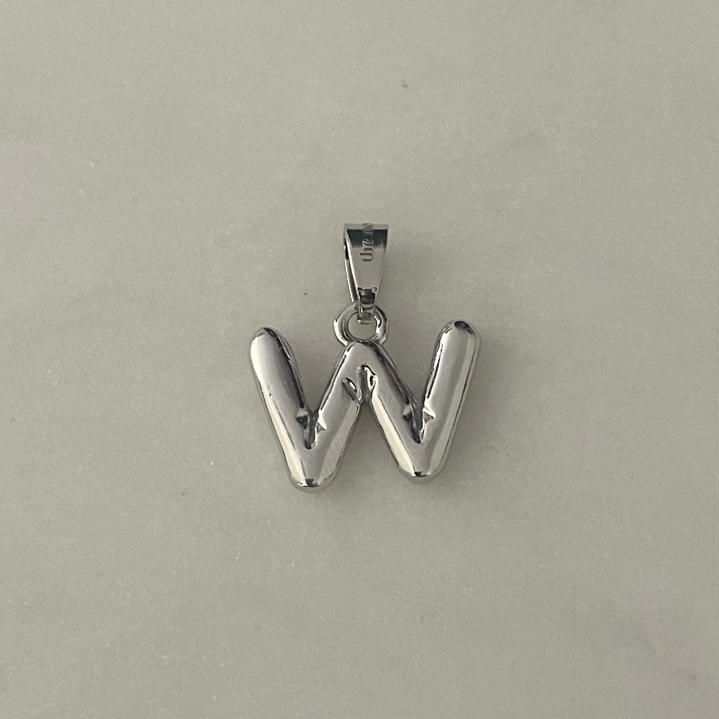 the BUBBLE LETTER charm