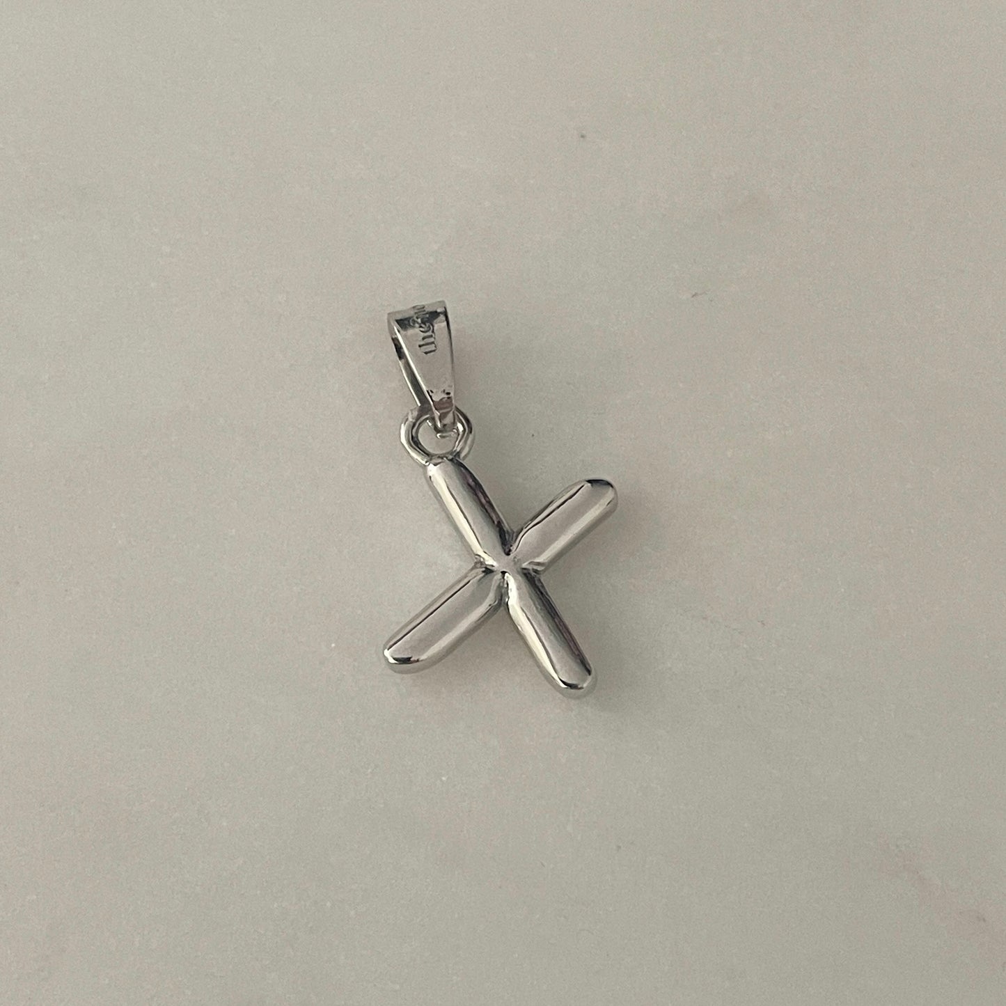 the BUBBLE LETTER charm